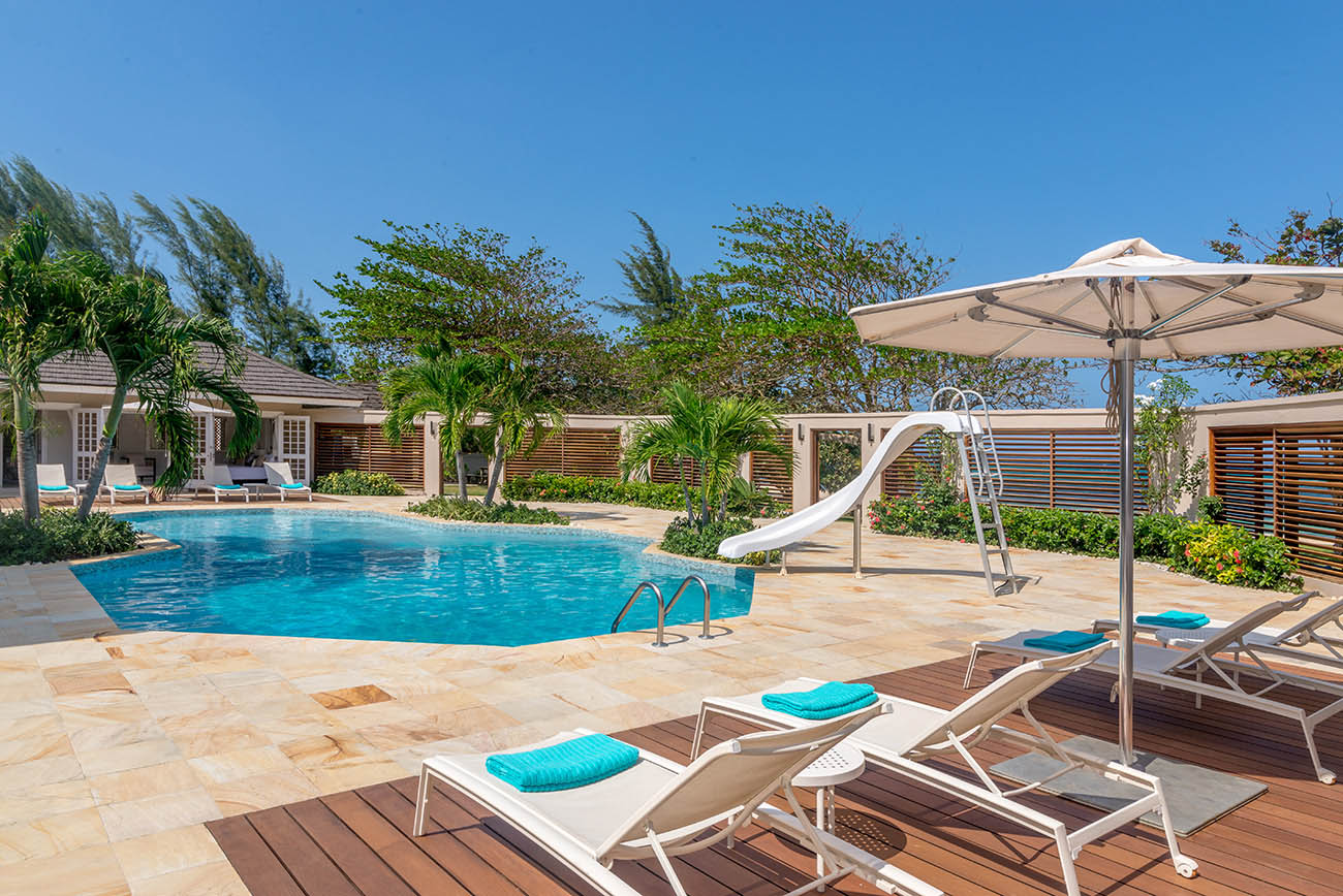 Villa Mara Pool Deck with Lounging Chairs & Sunshade